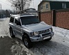 Дефлектор капота (шелкография серебро) MITSUBISHI PAJERO / MONTERO