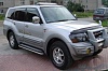 Очки на фары (Дымчатые) MITSUBISHI PAJERO / MONTERO (2002-2006)